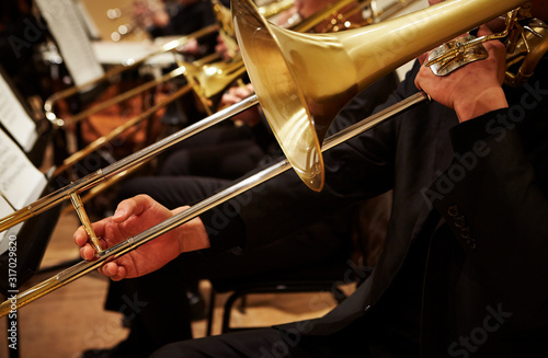 Foto Playing the trombone in orchestra