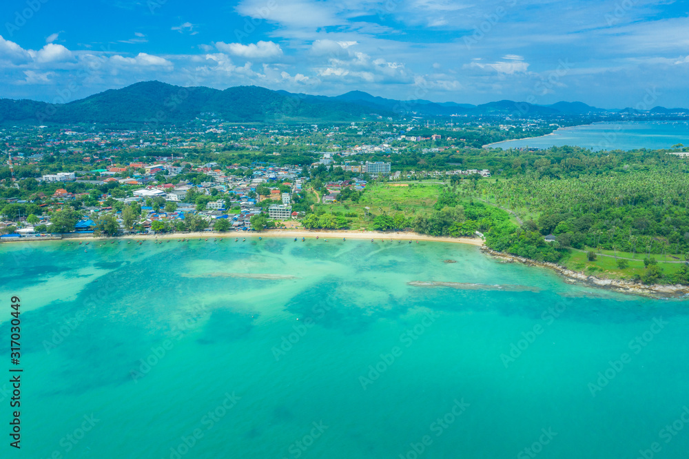 Aerial view drone shot of long tail boat at rawai beach,phuket Thailand Aerial view drone shot of long tail boat at rawai beach,phuket Thailand
