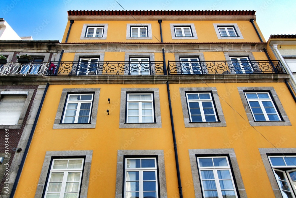 Fototapeta premium Old colorful tiled facades in Porto city