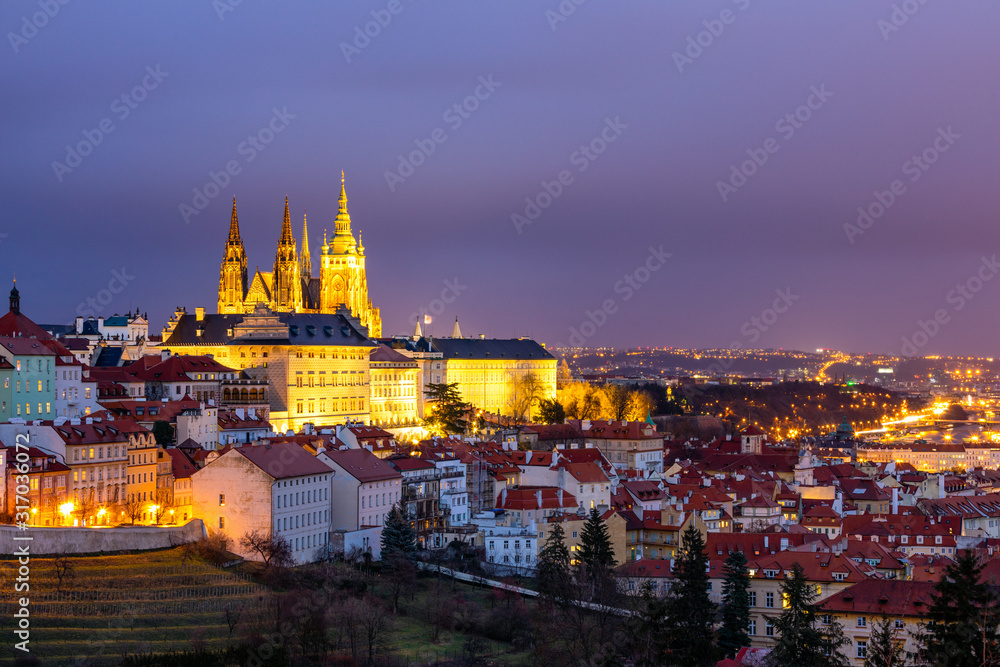 Prague Castle and Lesser Town panorama by night. View from Petrin Hill. Prague, Czech Republic. View of Prague Castle from Strahov monastery at night. Prague, Czech Republic
