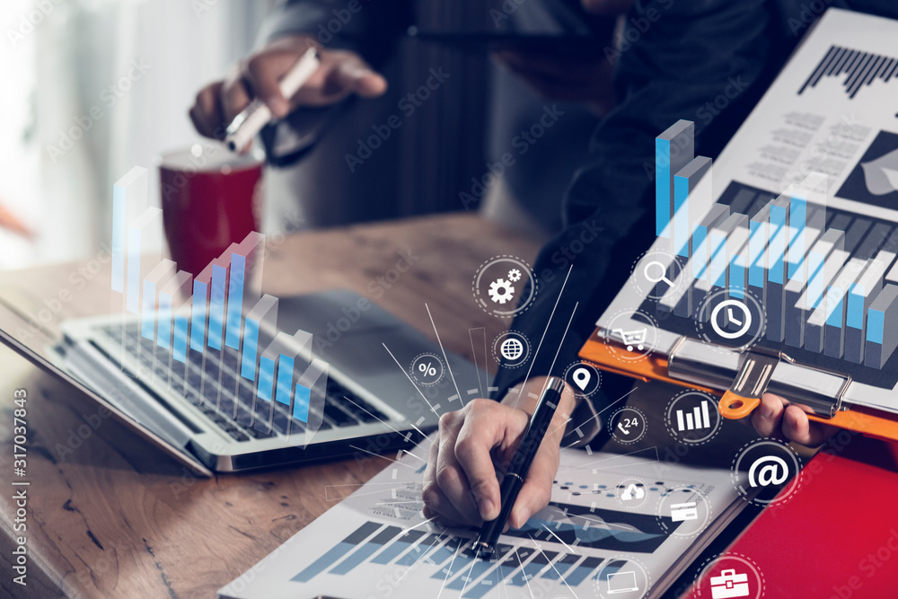Hands of business people working with network interface icons on office table. Double exposure business Concept. Hands of business people working with network interface icons on office table. Double exposure business Concept.