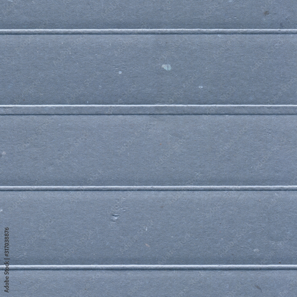 Fototapeta premium Blue vintage rough sheet of carton. Recycled environmentally friendly cardboard paper texture. Simple minimalist papercraft background.