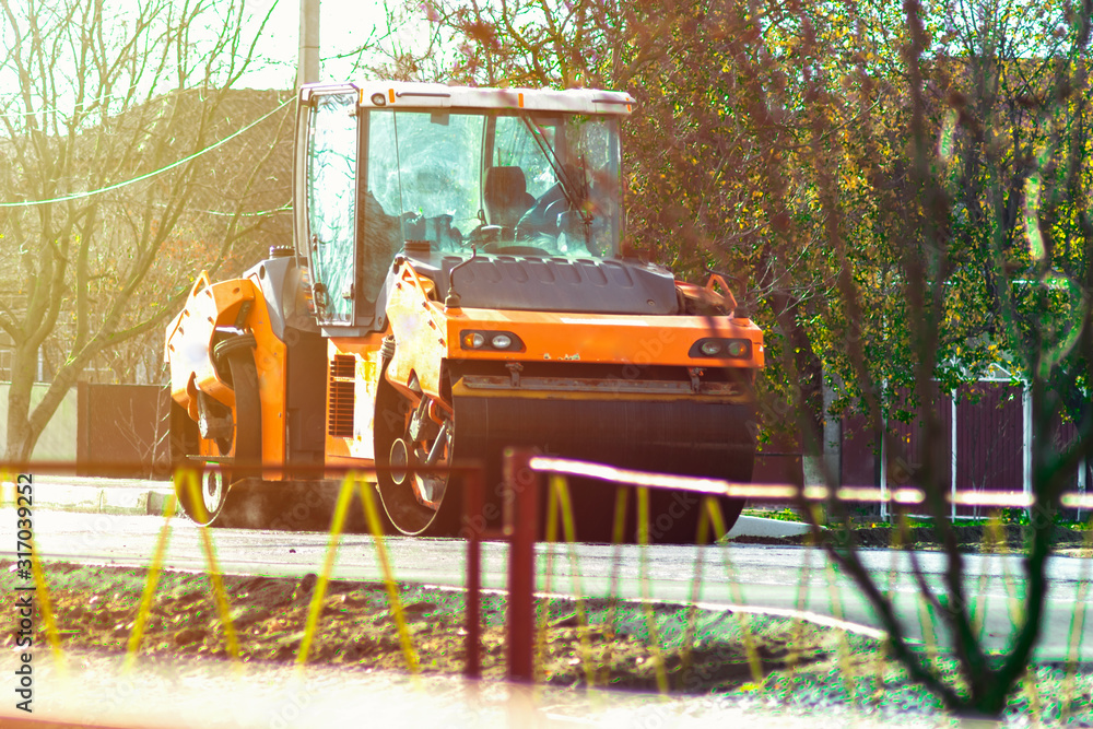 Road rollers building the new asphalt road. wagon, truck, paver machine Road rollers building the new asphalt road. wagon, truck, paver machine