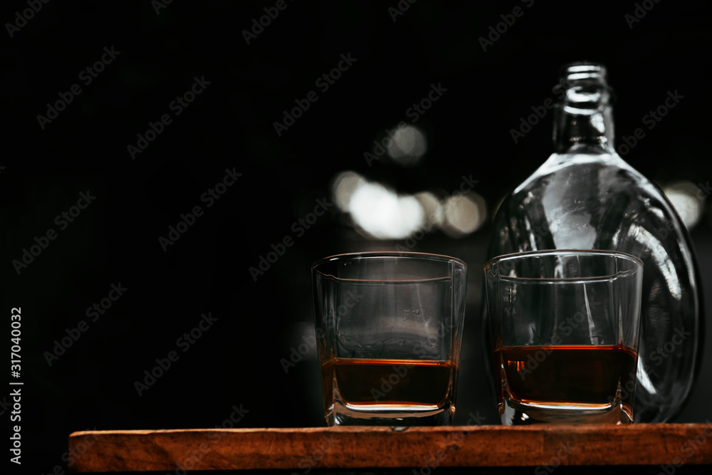 whisky shot glass at bar counter. whisky shot glass at bar counter.