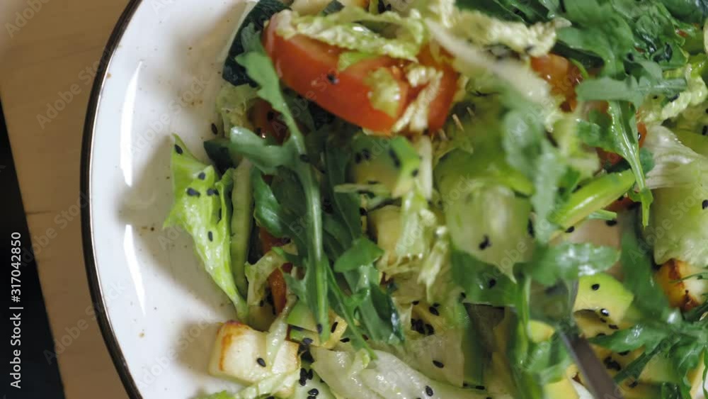 fashion food design. vegetable salad with rucolla and avocado fashion food design. vegetable salad with rucolla and avocado
