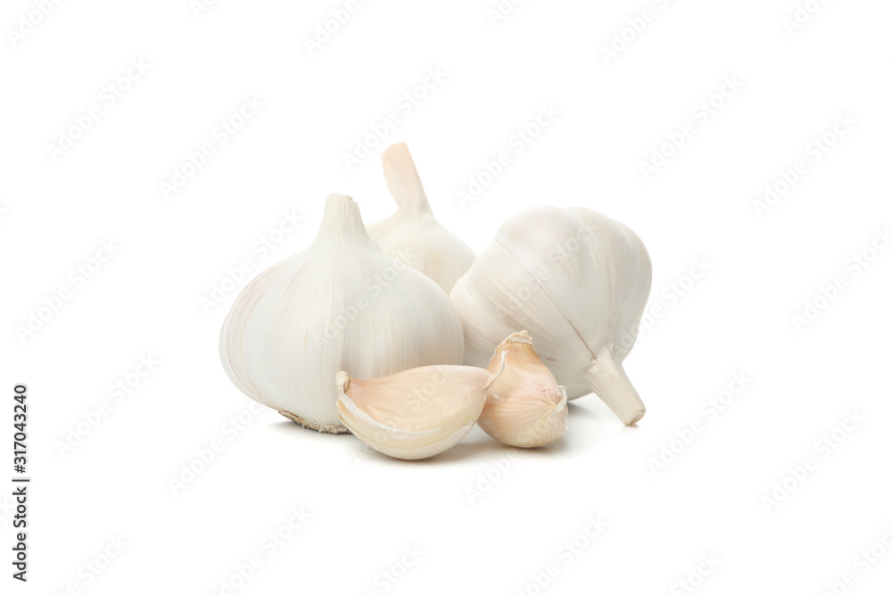 Fresh garlic bulbs and slices isolated on white background Fresh garlic bulbs and slices isolated on white background
