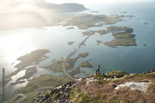 a view from Volandstinden  mountain in Lofoten islands in north of Norway..famous kubholmenleia bridge 