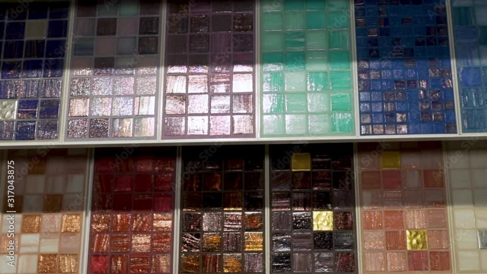 Close-up of a large selection of ceramic mosaic tile samples in the home decoration materials ceramics shop. Close-up of a large selection of ceramic mosaic tile samples in the home decoration materials ceramics shop.