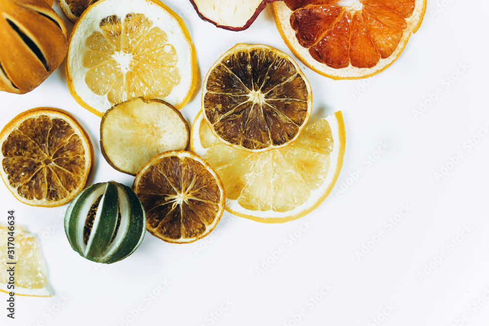 Dried fruits, lemons, oranges, lime, apples on isolated background. Food, vitamin, healthy organic food concept Dried fruits, lemons, oranges, lime, apples on isolated background. Food, vitamin, healthy organic food concept