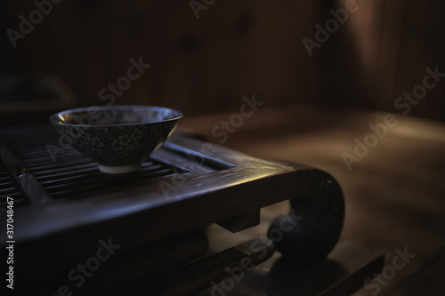 Chinese tea ceremony, tea table, cup / teapot on the table, oriental traditions