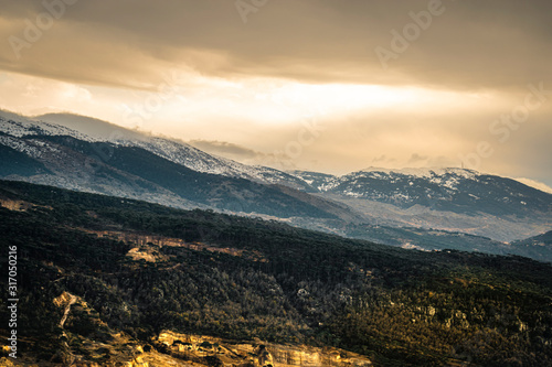 The mountains of Lebanon were once shaded by thick cedar forests and tree is the symbol of country. Beautiful landscape of mountainous town in winter  Eco tourism  Chouf district  with large vistas