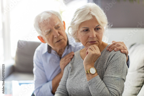Senior couple having an argument at home