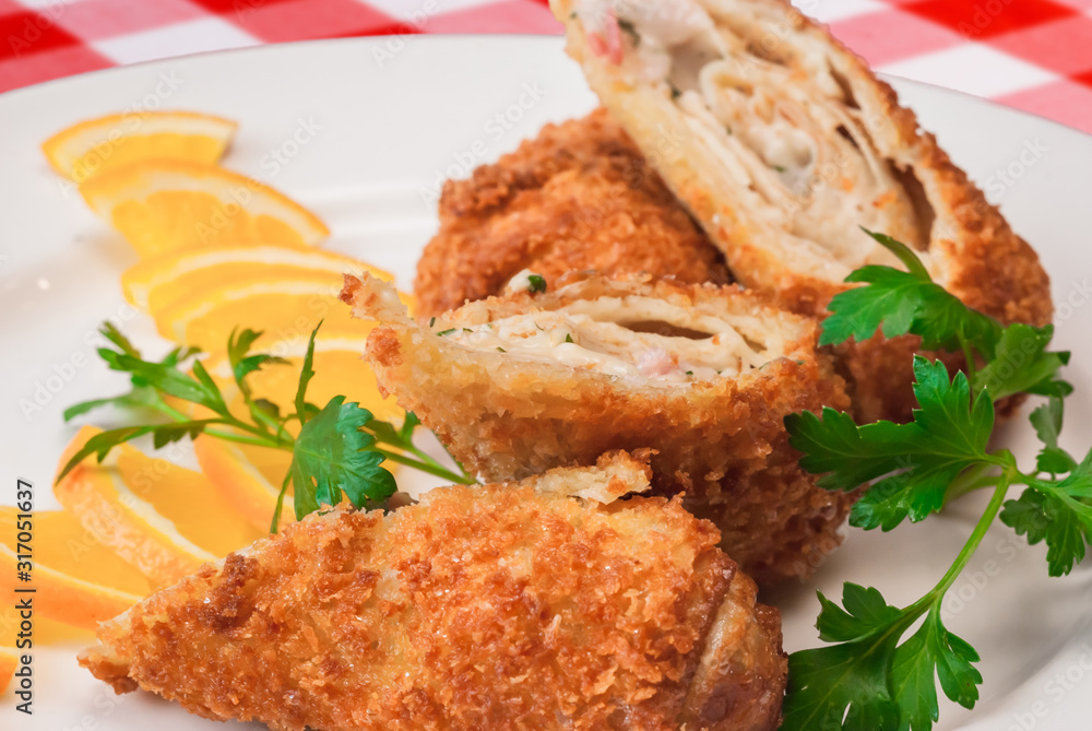 Chicken roll Cordon bleu, breaded dish closeup Chicken roll Cordon bleu, breaded dish closeup