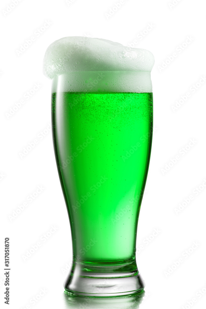 Fresh natural light beer with thick foam in a glass. Fresh natural light beer with thick foam in a glass.