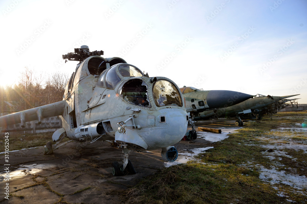 old broken military helicopter without blades and glasses old broken military helicopter without blades and glasses