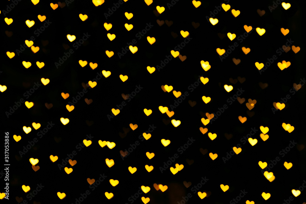 Festive overlay effect. Golden heart bokeh festive glitter background. Christmas, New Year, Valentine's day any other any purposes design. Festive overlay effect. Golden heart bokeh festive glitter background. Christmas, New Year, Valentine's day any other any purposes design.