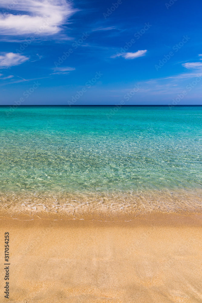 Yellow warm sand and summer sea with sky and free space. Sea, Sand, Sky and summer day. Beach and sea on a summer day, travel concept, vacation and relaxation. Summer sand beach and sea background. Yellow warm sand and summer sea with sky and free space. Sea, Sand, Sky and summer day. Beach and sea on a summer day, travel concept, vacation and relaxation. Summer sand beach and sea background.