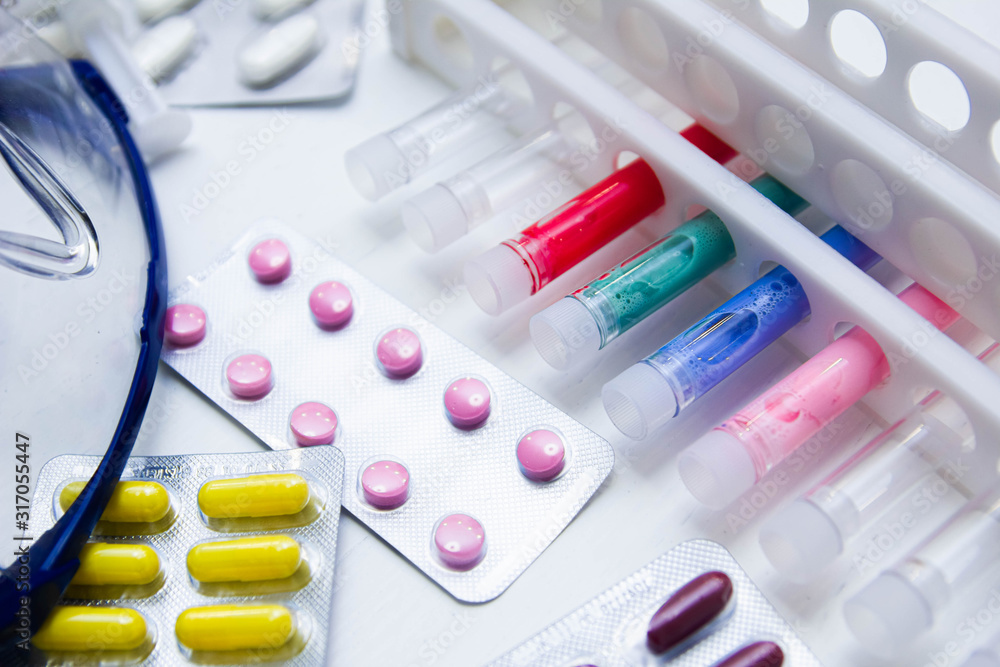 pills and test tubes. The concept of research on vaccination, pharmacology and biotechnology of drugs. science and medicine. pills and test tubes. The concept of research on vaccination, pharmacology and biotechnology of drugs. science and medicine.