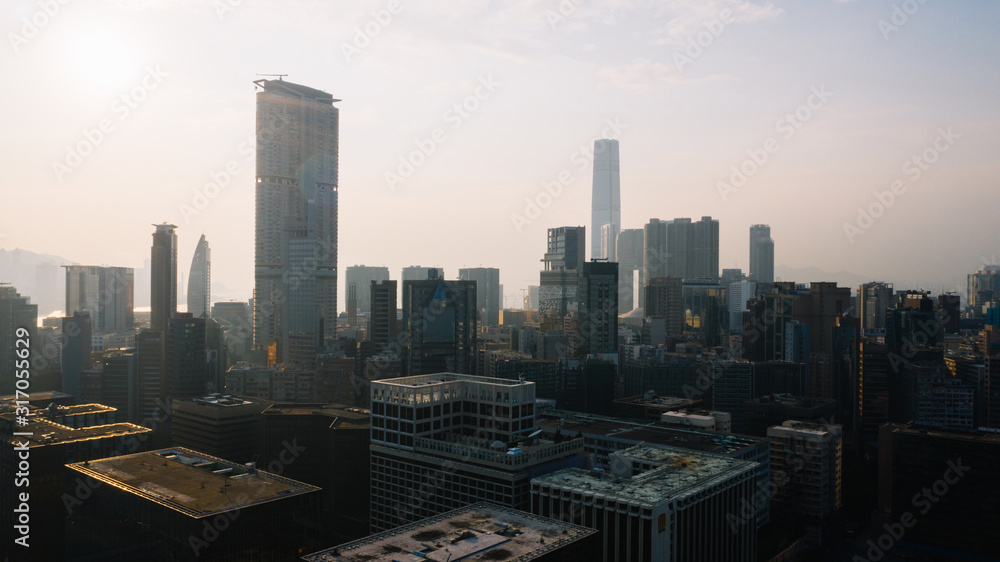Aerial scenery panoramic view of Hong Kong modern skyscrapers district. Urban drone view with silhouettes of corporate business and financial enterprise buildings. Metropolitan city infrastructure
