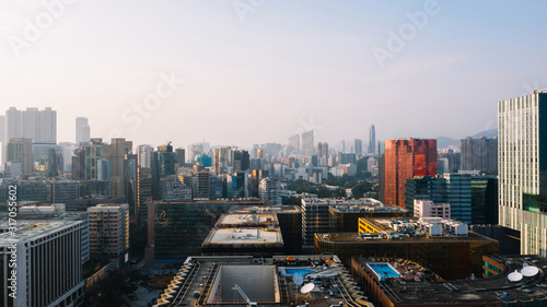 Aerial scenery panoramic view from drone of Hong Kong skyscrapers skyline metropolitan landscape. Modern concrete cityscape of urban downtown with business and financial buildings. City infrastructure