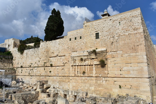  Remains of Robinson's Arch along the western wall of the Temple Mount. It was built as part of the expansion of the Second Temple, initiated by Herod the Great, at the end of the 1st century BCE. photo