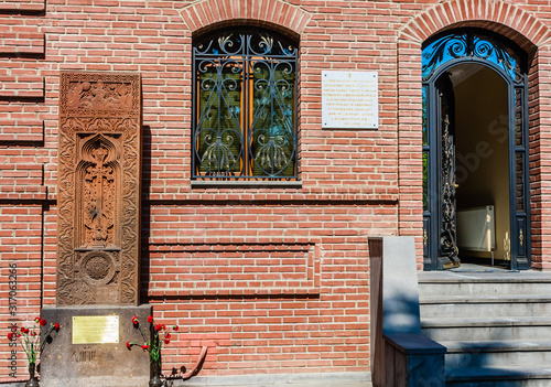 Khachkar with fine patterns at the wall   Ejmiatsin Church of Armenian Apostolic church, located in Avlabari District, Tbilisi, Georgia. photo