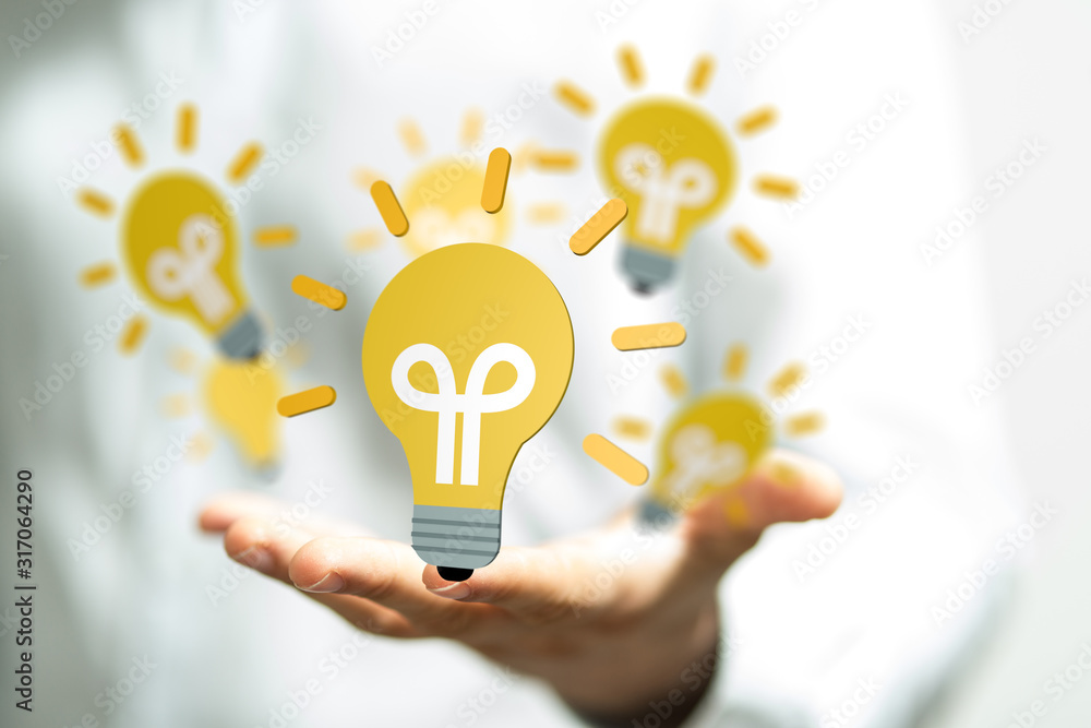 touching light bulbs, new ideas with innovative technology and creativity. touching light bulbs, new ideas with innovative technology and creativity.