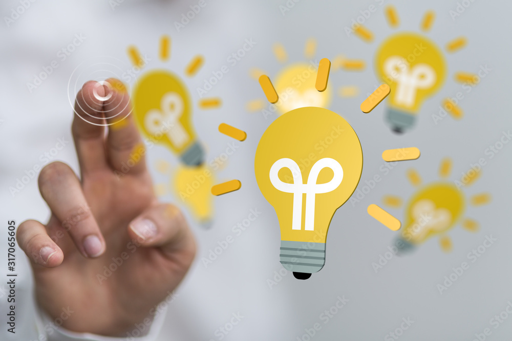 holding illuminated light bulb, idea, innovation and inspiration concept. holding illuminated light bulb, idea, innovation and inspiration concept.