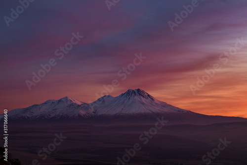 Snowy Mount Hasan Volcano Anatolia Turkey Aksaray Sunset Pink Red Orange Sky © numan