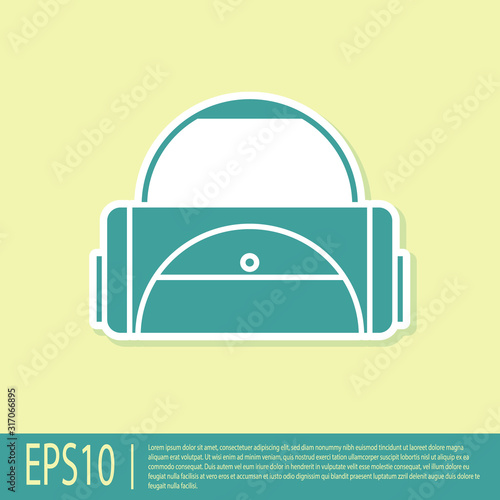 Green Sport bag icon isolated on yellow background. Vector Illustration