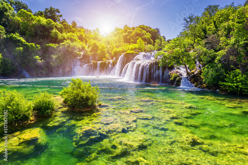 Fototapeta Naklejka Na Ścianę i Meble -  Beautiful Skradinski Buk Waterfall In Krka National Park, Dalmatia, Croatia, Europe. The magical waterfalls of Krka National Park, Split. An incredible place to visit near Split, Croatia.