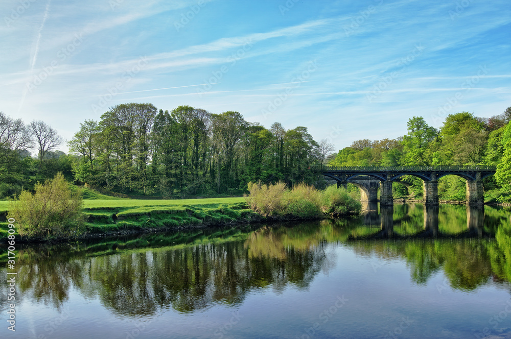 A wide view of the river Lune and bridge, near Lancaster