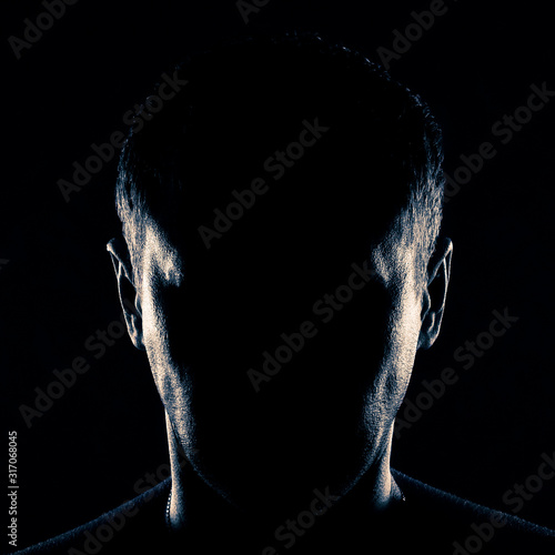 A portrait of a man with no face visible. photo