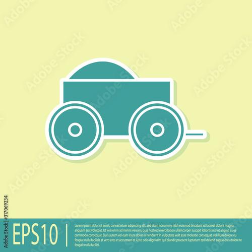 Green Wooden four-wheel cart with hay icon isolated on yellow background. Vector Illustration