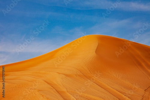 Red Sand Desert Barchan and Blue Sky Lanscape