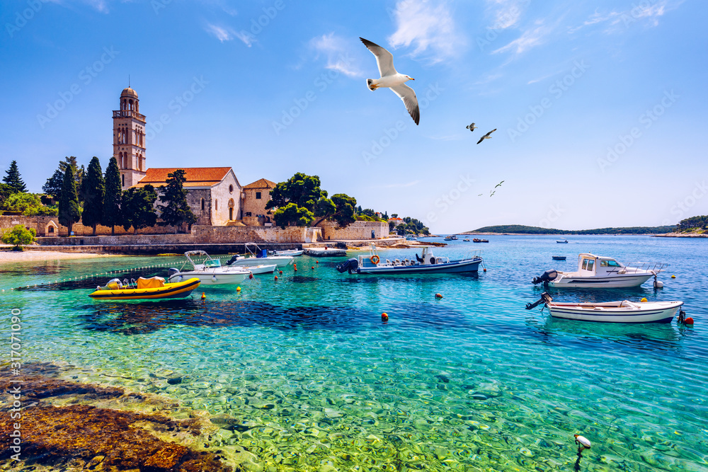 amazing with fishing boats in front of town Hvar, Croatia. Harbor of