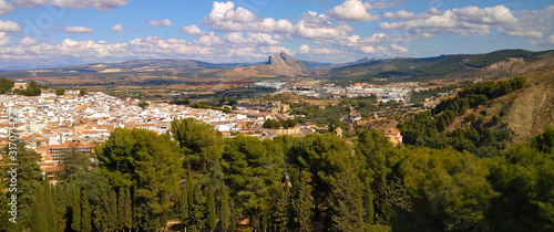 Aerial panorama view on the city of Antequera with the "Lover's Rock" in the background; Andalucia, Spain, Europe