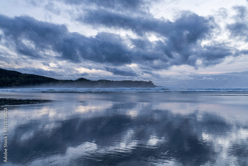 Evening reflections on west coast tidal flat