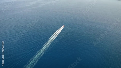 Wallpaper Mural Forward drone motion over open water with a speedboat near Hawaii. Torontodigital.ca