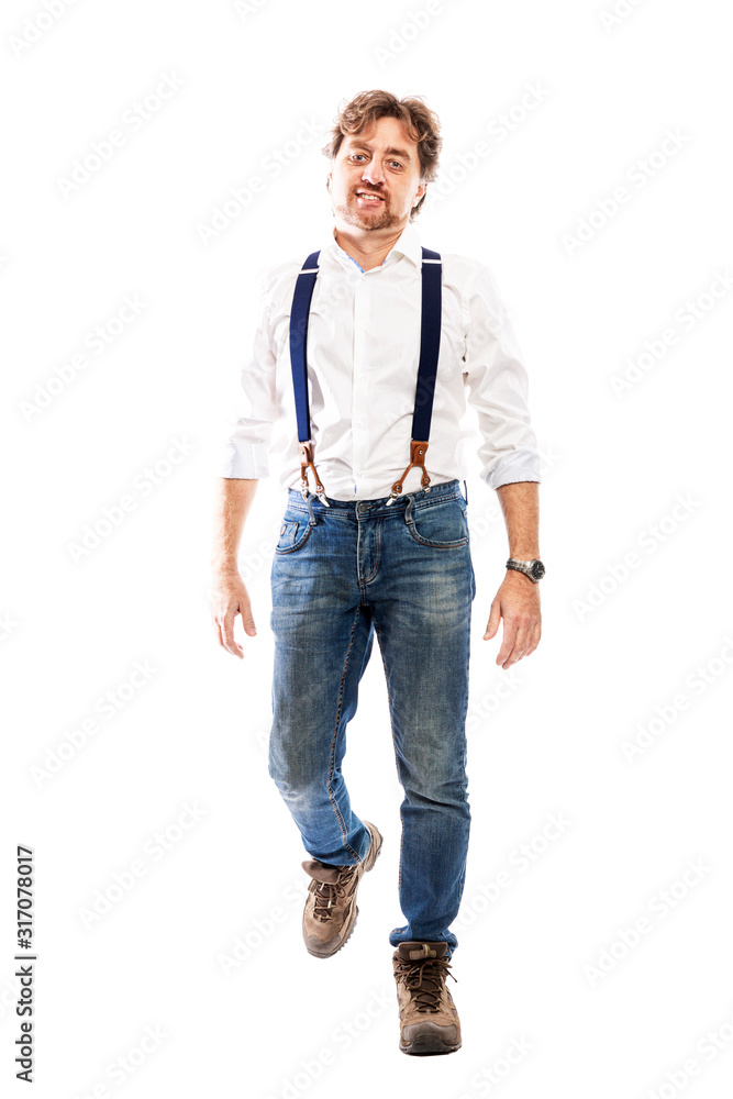 Smiling man in jeans and a white shirt. Full height. Isolated on a white background. Vertical. Smiling man in jeans and a white shirt. Full height. Isolated on a white background. Vertical.