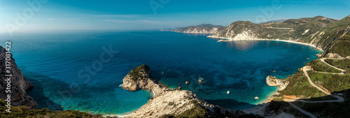 Amazing coastline in Greece under sunlight. Wonderful summer seascape with perfect blue sky of Ionian Sea. Assos. Kefalonia. Greece.