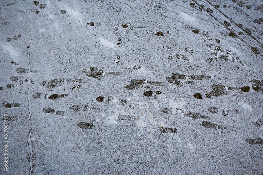 tracks asphalt snow, ice, people’s tracks from shoes on snow, snow removal weather tracks asphalt snow, ice, people’s tracks from shoes on snow, snow removal weather