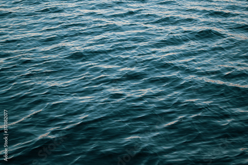 The river, the flow of water. Sea abstract texture.
