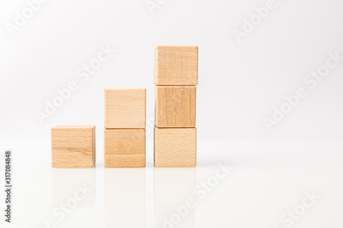 Fotografi wooden cubes on a white background
