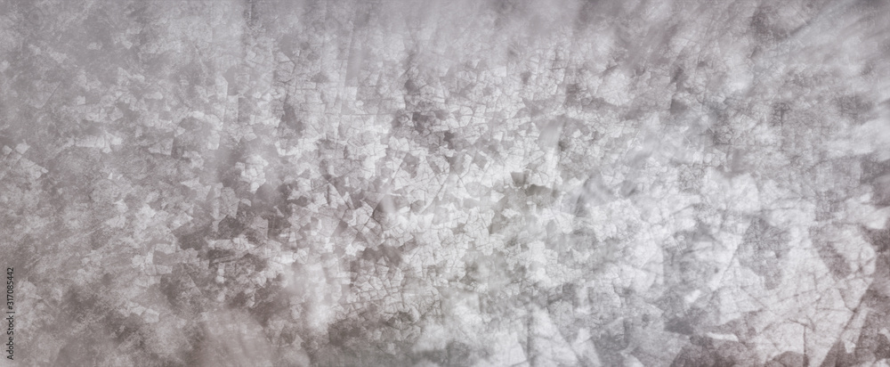 Gray background with white peeling crackled paint grunge in old vintage background banner design with soft blur bokeh effect Gray background with white peeling crackled paint grunge in old vintage background banner design with soft blur bokeh effect