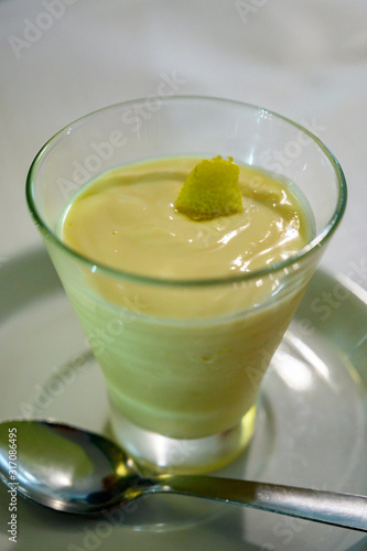 Sweet dessert, whipped lemon mousse served in glass