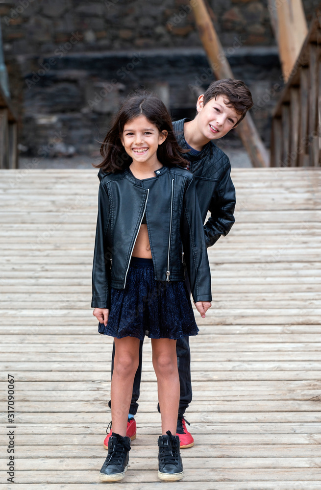 Fototapeta premium Cute boy and girl posing