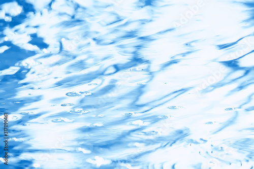 concept blue abstract background water   ocean  lake waves on water  reflection of ripples on the river