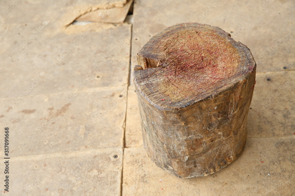 Chopping board block and Meat cleaver on wooden background . circle wooden chopping block in kitchen for meat slice . Chopping board block and Meat cleaver on wooden background . circle wooden chopping block in kitchen for meat slice .