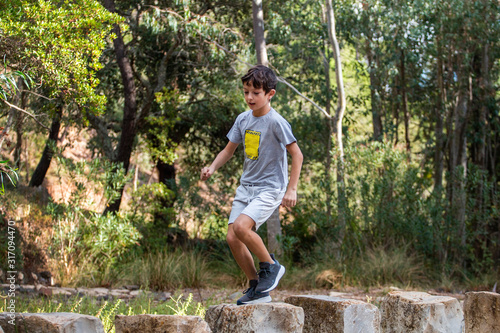 Cute boy outdoor running